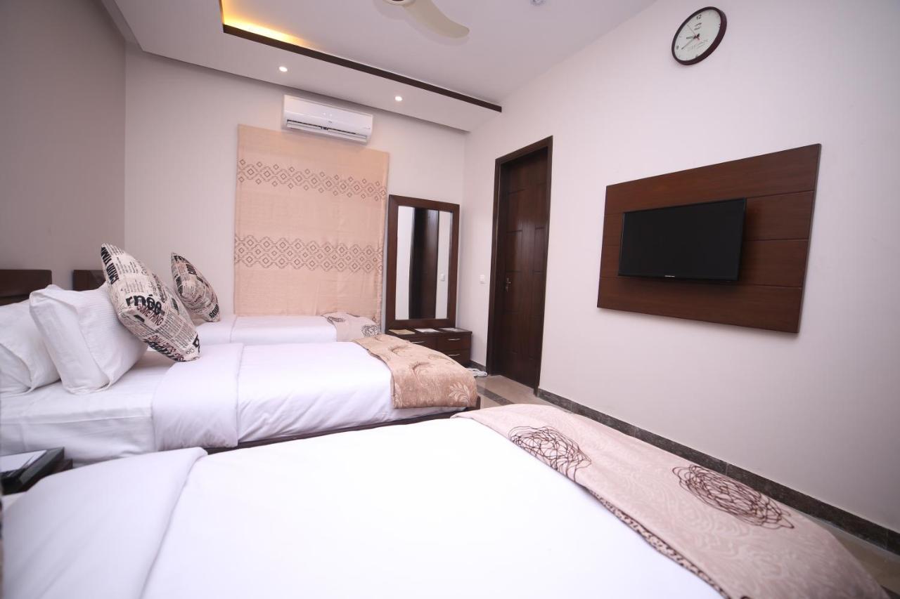 Zifan Hotel & Suites Карачи Экстерьер фото